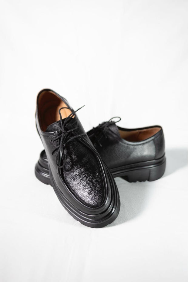 G03 Chaussure en cuir